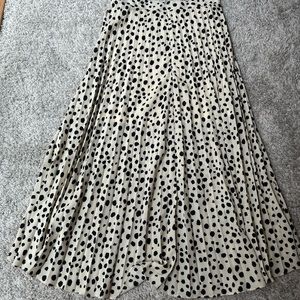 She and Sky high low pleated skirt. Black and white. Size small.